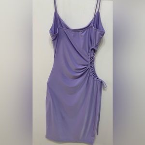 A sexy lavender knee length dress. Side circle cut out.